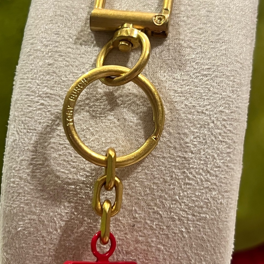 Tory Burch Rotating Geo Key Fob/bag charm in red and pink hues. - Picture 5 of 6